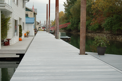Marina dock decked with MAXiTUF recycled plastic lumber
