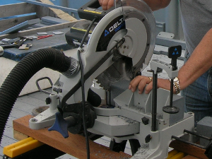 Cutting MAXiTUF plastic lumber deck boards